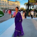 Christina Milian Instagram - Splashes of color & love in Côte d’Azur 💒💜✨ When the wedding invitation says ‘Colorful, Elegant Indian Attire’ you dress the part & even better we experienced the culture! Such a beautiful parade down the isle with the groom. #WeUnderstoodTheAssignment 🥳 Congrats Again to the Kamani’s! Had a blast. Outfit: @indianfashionsparis