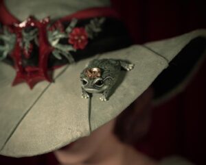 Christine McConnell Instagram - A hand crafted Witch’s Hat 🎄🐸🎄

I was inspired by the amazing hat @lordxblackwood made for me in 2019 and decided to have a go at making my own 🎉

It was built using window screening as the base. I then hand sculpted “Pancake” the Frog, as well as the buckle ✨

Full episodes are on Patreon 🪄