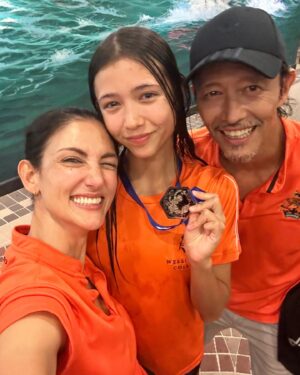 Cindy Sirinya Bishop Instagram - So our goal was to at least make the finals at Nationals, but babygirl decided to go for it and clenched SILVER for 200m Breaststroke Women 14-15!! 😱🤩👏🏻 What a start to the week!!

So proud of all our @wcibswim  girls @mayatwinstar and Klarnissa Kong for their amazing swims as well. Let’s go girls! 

Yes that’s me in the last clip being dramatic bawling my eyes out while Byron can hardly keep it together. Sorry for being #cringemom 🙈Promise to try to keep it together if any more medals are won this championship. Stay tuned!!!

#leilacbishop #เงือกเลล่า #thailandnationalswimmingchampionship2024 #arenathailandagegroupswimmingchampionship2024 #thailandnationalswimming #200mbreaststroke