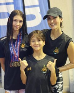 Cindy Sirinya Bishop Instagram - It’s official. We are a swim family.😅🏊🏼‍♀️🏊🏼‍♂️💪🏼 For those of you who know what it’s like, you know what I’m talking about… the long long days, the getting up at the crack of dawn, the going on way too little sleep, the losing our voices from screaming poolside, the never ending drying off, changing into ridiculously expensive carbon fiber racing suits with special gloves and aprons because God forbid you accidentally tear the fabric, the drying off again, the detangling sprays, the finding of lost water bottles, and flip flops and goggles, the elation of getting a PB or a medal, the tears and frustration of not, the sinus infections, ear infections, the stuffy noses, or head bumps from hitting the wall, the checking checking checking & rechecking of times on Splash Me and Meet Mobile, the sheer amount of food and snacks and protein bars and electrolytes and coffee, did I mention coffee? needed to sustain all of us, the power banks to power our phones in order to capture all the VDO clips of every race plus endless doom scrolling on social media in between and for Roblox of course, the pillows and blankets and fold up chairs and sleeping mats and ice chests and trips to 7 eleven, the warm ups and cool downs and EVERYTHING in between. It’s all worth it. Too see those proud smiles and raised thumbs and even the snot and hot tears….. it’s all worth it. ❤️ This was Martin’s Cup Swimming Championship 2024. Aiden gots PBs in nearly every event and learned a lot about setting goals and dealing with expectations. He’s really coming along and we are so so proud. And Leila took home: 🥇50m breast 🥇200m breast 🥈50m butterfly 🥈100m breast 🥈400m IM 🥉200m IM 🥉100m butterfly 🥉200m free & another 🥇🥈 for team relays Putting her third overall in 15 year age group (although she just turned 14 less than 3 months ago 😅) A testament to her hard work and dedication. Thank you also to Coach @goddard_james and @wcibswim 💪🏼💪🏼💪🏼 We are all over the moon with her progress so far. NEXT STOP: THAILAND NATIONALS BABY!! #proudmama #swimming #swimmom #SwimDad #leilabeila #aidenrockstar #martinscup2024 #thailandswimming #tsa #wcibswim