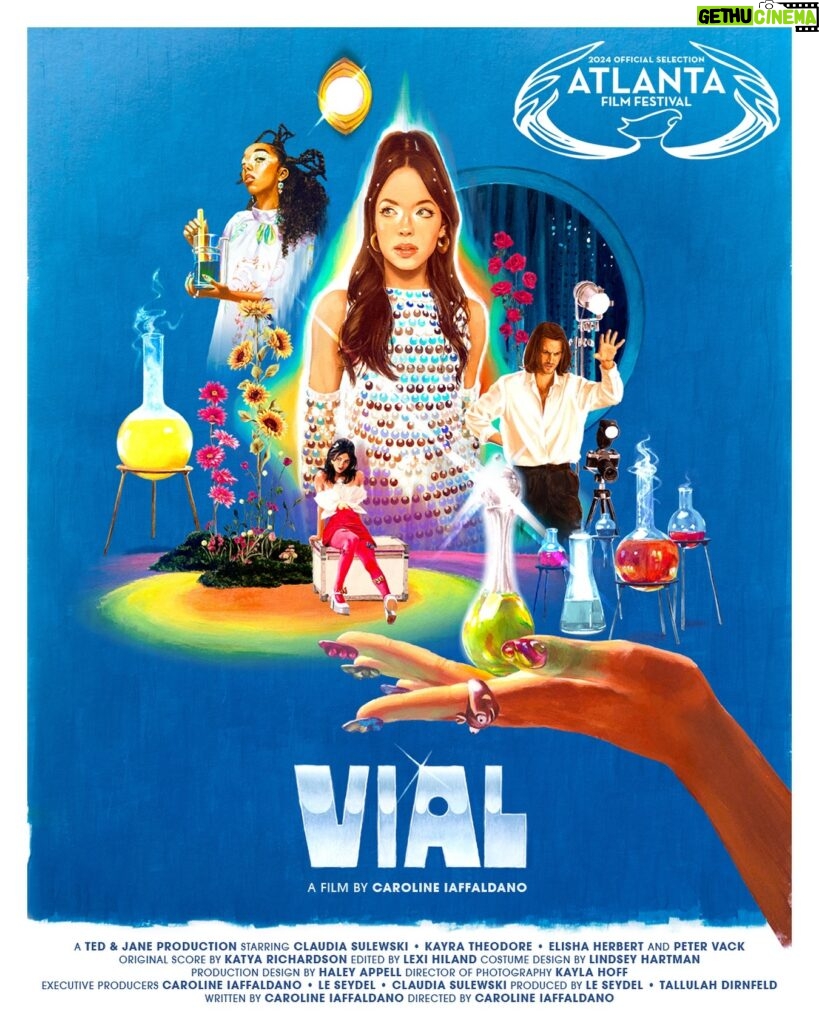 Claudia Sulewski Instagram - Thrilled to announce Vial will have its world premiere at the Atlanta Film Festival on May 4th! It is such an honor to have our film screened at a festival of this caliber. Vial is a technicolor universe of surrealist alchemy – a co-creation amongst primarily women who showed up to believe in magic. Thank you to the cast and crew. We can’t wait to share it with you. Yay girls trip to Atlanta!! Unreal hand-painted poster of my dreams by the one and only @charlottedelarue 🧪⚗️