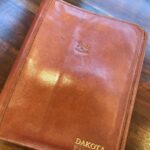 Dakota Fanning Instagram - This script binder has been with me since I was 8 years old, and it was actually a gift from @alecbaldwininsta when we worked together on The Cat in the Hat! Anything and everything I’ve worked on since then, has lived in here. Currently housing #theangelofdarkness 😊