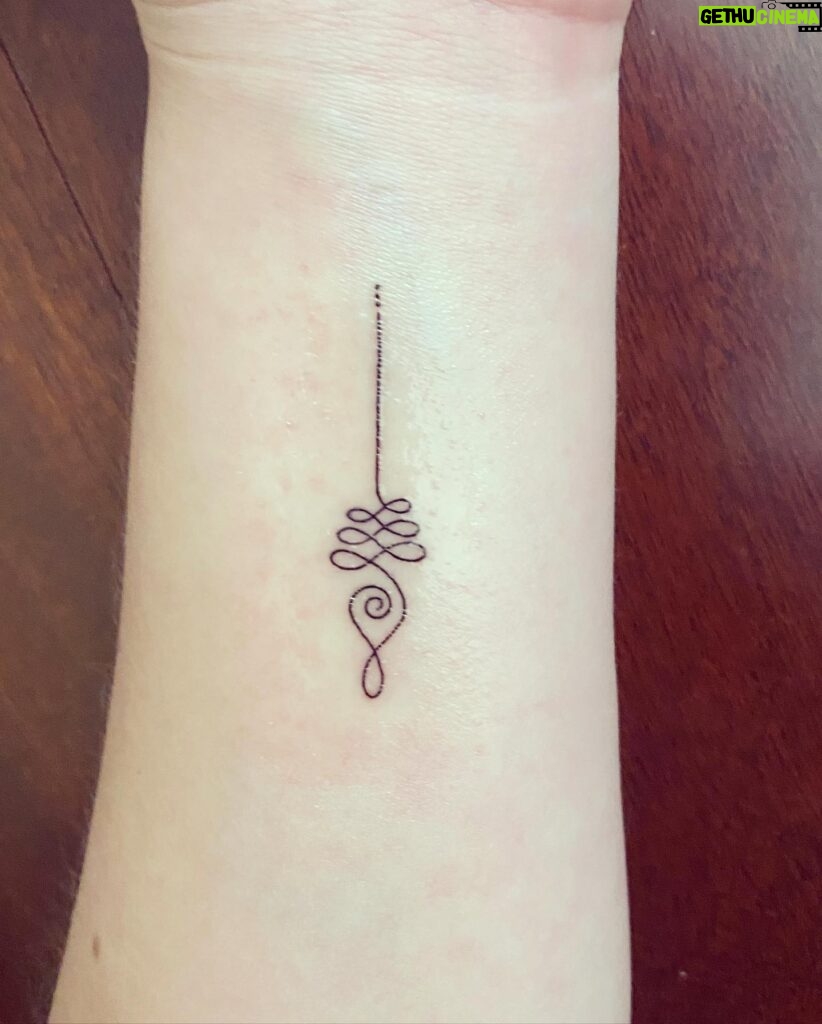 Dalila Bela Instagram - Thank you so much @antstattoo._.leo for the awesome tattoo!!! And thank you @antstattoo for having me!! The tattoo I got is of an unalome! It’s a Buddhist/spiritual symbol that represents the path that we all travel over the course of our lives. Our journey can be convoluted, but it will eventually end in a straight path, therefore symbolizing enlightenment and mental freedom!! I’m in love with how it came out!! #covidsafe #tattoo