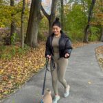 Daniella Salvi Instagram - My baby Coco’s first time in his stroller! 🐶❤️ My angel is turning 16 soon and is still so strong and full of life but he gets tired after 5-10 minutes into walking now. So we got him a stroller so we can go to more places together 🥰🍂 He loves observing his surroundings 🤍 jacket: @revolve