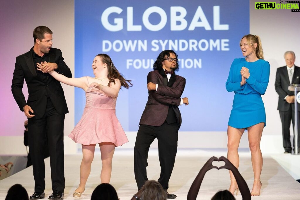 Danielle Savre Instagram - It was an absolute honor to walk down the runway in style with Hussein at the @globaldownsyndrome #bebeautifulbeyourselffashionshow this last weekend!! I’m thankful to have been part of such a magical night to fight for life changing #downsyndrome research and medical care and to celebrate the Down syndrome community. Thank you @caterinascorsone for the invite and introduction! 💙