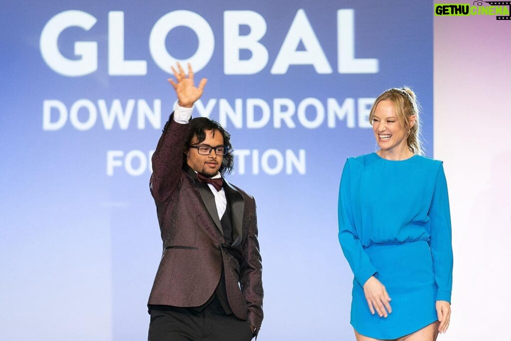 Danielle Savre Instagram - It was an absolute honor to walk down the runway in style with Hussein at the @globaldownsyndrome #bebeautifulbeyourselffashionshow this last weekend!! I’m thankful to have been part of such a magical night to fight for life changing #downsyndrome research and medical care and to celebrate the Down syndrome community. Thank you @caterinascorsone for the invite and introduction! 💙