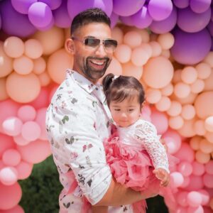 Dhar Mann Instagram - Happy 1st birthday to my beautiful girl @ella.rose! I can’t believe how quickly you’re growing up. I get sad thinking about how you won’t be holding my hand forever, but then I feel better knowing that at least you’ll always be holding my heart 💗 Please know that your mommy and daddy love you so much! No matter what you decide to do in life we will always support you and be so proud of you baby girl. You’re the greatest blessing @laurag_143 and I could’ve ever prayed for🙏🏽👶🏻
-
P.S. if you want to see her 1st birthday party vlog the link is in my bio!
