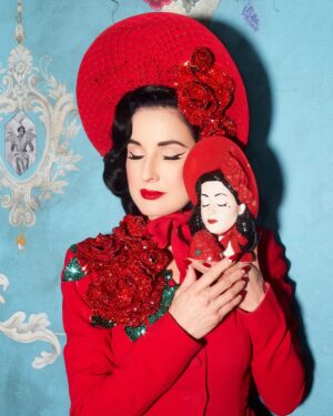 Dita Von Teese Instagram - Presenting the 6th #Glamour Girl Vase in our series, based on the #NewLook suit made by #Dior #hautecouture for my “Lazy” #burlesque act, which debuted @crazyhorseparis_official in 2009. 
Available in limited quantities, order your #ladyheadvase at luxfaire.com 💋(link in bio) 

#glamourgirlvase #diorhautecouture by #johngalliano @stephenjonesmillinery #swarovski #ladyheadvase #ditavonteese 

📷 @sequoiaemmanuelle