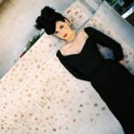 Dita Von Teese Instagram - Flashback to the mid-90s in Paris at #perelachaise with the monument of #oscarwilde before it was protected by glass. I personally did not add a lipstick print, as I had just visited #victornoir 🖤 More of these photos, plus video are up for subscribers, link in bio. 📷 @christophe_mourthe