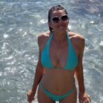 Elizabeth Hurley Instagram – In heaven 💗 Ibiza Bikini @elizabethhurleybeach sunglasses @eltonjohneyewear