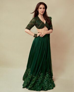 Elli AvrRam Instagram - She’s Evergreen🕊️🎻

Dressed in @neeta_lulla @houseofneetalulla 
Hair & Makeup by @fab_beauty___ 
Photographer @mayur_butwani 
#elliavrram #yourstruly #evergreen