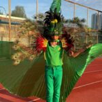Emelda Rosemila Instagram - Cheering for Edra smlm kat sukan sekolah. Edra jadi mascot team Temenggung. Busy mum carik bulu merak everywhere. Nasib baik ada uncle pejoy @pejoyyahaya yg selalu pantas bila bab2 wardrobe & costume nih😂. Tq uncle Pejoy.🫰🏻 Daddy habis shoot 5am, so tak dpt la join tgk anak peacock dia marching hehe. Mummy sorg jer laa yg cheering, sokay sokay, i always enjoy my own company😄. So proud of my peacock. Congrats Edra! @edrarafaeladlin U did great!💚 19.8.23