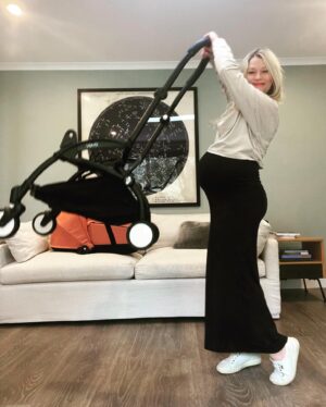 Emilie de Ravin Instagram - New pram for Bebe-to-be ! 
I had a yoyo for both my older kids & it was by far my fav go to pram for everyday use & travel. It’s super small & lightweight, folds/unfolds in like 5 seconds, & super chic! (Loving this ‘Ginger’ colour pack, & there’s tons more to choose from)
This is with the bassinet obvi, but just pop that off when buba is 6mths old & pop on the seat (which folds with the base!) & you’re set 😍.

#lifesaysgo #yoyobabyzen #gifted
@babyzen_au 

Outfit: @bumpsuit ❤️