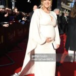 Emily Atack Instagram - Huge thank you @bafta for having me and bump last night ✨ Thank you to @ghdhair - what a bloody LOVELY team you all are! And to @lancomeofficial - The fabulous @messapaulo especially - for hiding my extreme lack of sleep 🫣 And to @thesavoylondon for letting me sample their entire room service menu. Dress of dreams was @roland_mouret .. I felt like Princess ruddy Leia 😌