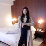 Emily Canham Instagram - Get dressed with me to explore Tokyo, Japan 🤪 these are my new fav trousers and i will not be taking them off!! Trench @burberry Top @skims Trousers @zara Bag @chanelofficial Shoes @adidas Hotel @editionginza 📍Tokyo, Japan #ootd #vacationoutfit #tokyo