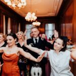 Emily Hampshire Instagram - I crashed my first wedding! Congrats Grant & Mark! (Learning how to Vogue was surprisingly easier for me than learning how to “peace & pout” 🥴)