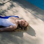 Emily Kinney Instagram - Thanks so much for listening to SWIMTEAM. Been overwhelmed and so inspired by all the kind notes about the tunes! Help me spread the music and tag a friend you think would like to hear it. 🏊‍♀️💫💕