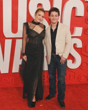 Emily Osment Instagram - Wowwwee what an unforgettable weekend in Austin! Huge thank you to the #cmtawards for being such incredible hosts @montanajordan and I had our heads on a swivel the whole night- and so wonderful to run into sweet @janeseymour from my Kominsky Method days! 
Thank you to my gorgeous date @gitanagamboa for being the most superb travel partner and @itsamandalim for putting together such a LEWK. I have never felt so sparkly —> @gemymaalouf @davidyurman @giuseppezanotti 
Such a momentous time to be in Austin in the path of totality for the solar eclipse. What LUCK. Feeling so filled up with good energy and joy joy joy. 10/10 Austin, no notes. Get ready for more Georgie and Mandy rull soon… ☀️ 🕶️ 🤠 ✨ 🎶