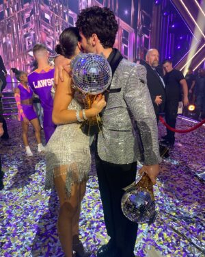 Emma Slater Instagram - THE CHAMPIONS!!!!! So so happy for these two, the season 32 winners @_xochitl.gomez @valentin. Flawless dancing and beautiful journey. Love this moment I captured between Val and @jennajohnson also, so cute 🥰 All the finalists put in so much hard work and dedication to their dances and their partnerships, congratulations to all of you guys @sashafarber1 @daniellakaragach @pashapashkov @theartemc. In the last video that’s the view we got for the big win and the pyro’s on stage caught us a little off guard 😂🫨 don’t worry we were safe ☺️