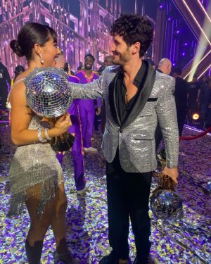 Emma Slater Instagram - THE CHAMPIONS!!!!! So so happy for these two, the season 32 winners @_xochitl.gomez @valentin. Flawless dancing and beautiful journey. Love this moment I captured between Val and @jennajohnson also, so cute 🥰 All the finalists put in so much hard work and dedication to their dances and their partnerships, congratulations to all of you guys @sashafarber1 @daniellakaragach @pashapashkov @theartemc. In the last video that’s the view we got for the big win and the pyro’s on stage caught us a little off guard 😂🫨 don’t worry we were safe ☺️