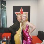 Evangeline Lilly Instagram - Backstage at @virginradiouk with #cassielang...the smart and sassy @kathrynnewton Katheryn and I are so different and yet so comfortable with one another. I think that's because we are both so unabashedly ourselves. #antmanandthewaspquantumania @antmanofficial #hopevandyne @lisastoreymakeup @kevinmichaelericson @pauledmonds217 (shave and a hair cut, two pence🎶) Colour by Jaime Powell @albertaferretti dress @bouguessa jacket
