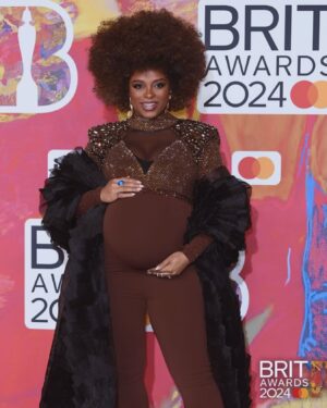 Fleur East Instagram - Baby at The Brits! Me and bump made it to what will probably be the last glam night out for a while, replaced by night feeds and nappies 😂 so I made the most of it with my @hitsradiouk fam. What a night! @brits 

Big up the amazing team that made this entire look possible. Thank you for making me feel fabulous! 🙌✨🥰

HAIR: @jhair_stylist 
MAKEUP: @anais.haz 
CUSTOM OUTFIT: @vickygilldesign