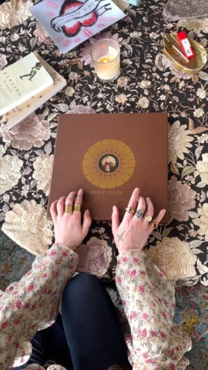 Florence Welch Instagram - Me and @autumndewilde and @thunderwingstudio worked so hard on this and she’s finally here!!!
Sharing with you the Dance Fever Deluxe 2LP Vinyl Boxset 🤎 Complete with Dance Fever lyric book, and a new song “Cassandra (Acoustic)” which is only available on the deluxe album 🏹 pre-order now, one week to go x x