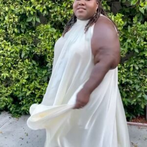 Gabourey Sidibe Instagram - Y’all about to get this look in about 30 different post over the next few months cuz I’m not going outside anymore.  It’s not even about Covid.  I just get hung over if I don’t get in the bed by 6pm. 

Anyway,
Styled by @kellyaugustine and assisted by @couturemoments_ in a  @nerecinacouture dress with @commedesgarcons @converse cuz my ankles ain’t ankling like they used to.  And get into this eye makeup!! @tobyfleischman went OFF!