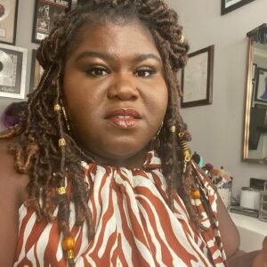 Gabourey Sidibe Instagram - A lowkey serve for my zooms.

Braid Instalation By @braidsbylorine 
Hairstyling By @misscopeland310 
Makeup By @tobyfleischman 
Styling By @kellyaugustine 
Chubby Face By the gummy bears @brandontour gives me as a “surprise” all the time.