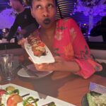 Glozell Green Instagram - You KNOW I am a major foodie! Let me tell you my friends at @eatstk in Las Vegas hit the jackpot 🎰 with the chefs tasting menu. 🤤💚 Such a fun evening with my friends. My favorite by far was the melt in your mouth sea bass 👨🏽‍🍳 A close second was the flaming dessert creation!!! What a great place to dine in the heart of the action. Definitely will be back! 💚💚