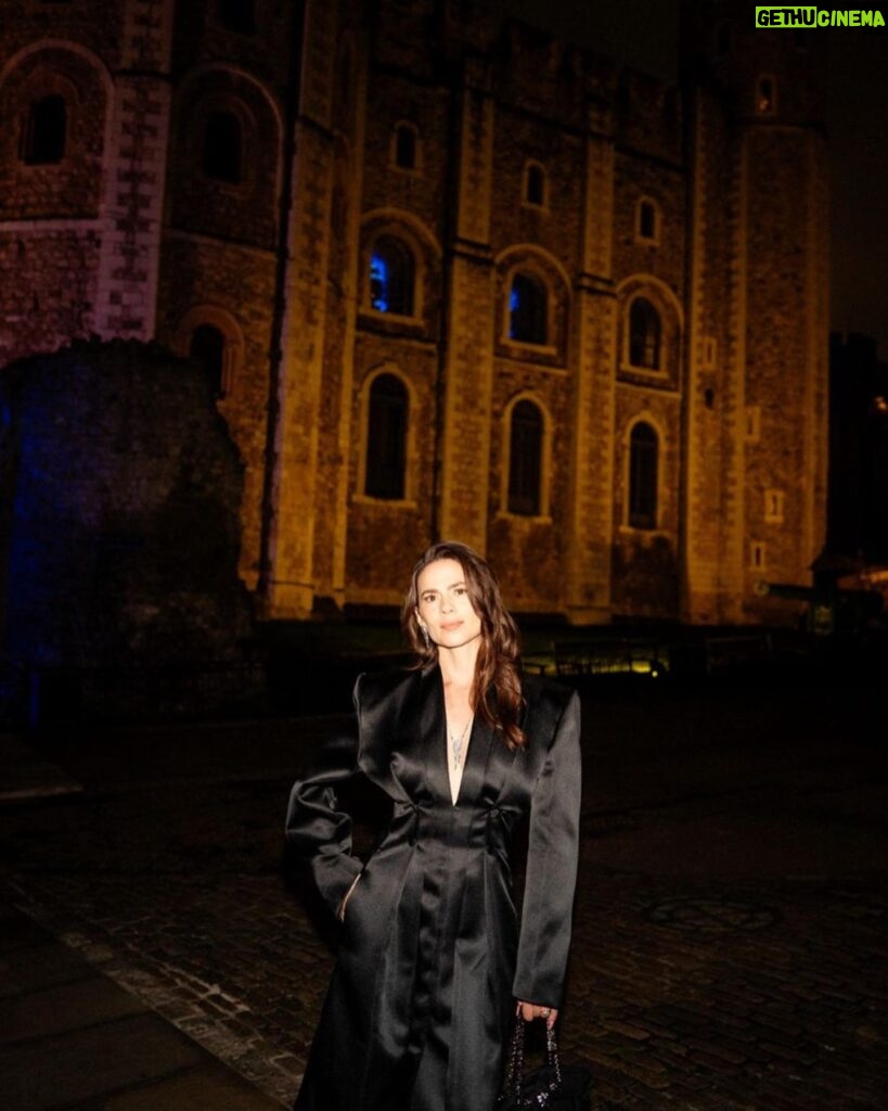 Hayley Atwell Instagram - Quite the dramatic flare here. The event: @garrard wearing their iconic meteorite Wings collection while draped in @givenchy. The setting: The Tower of London, home of an exceptional codpiece, amongst its unparalleled history. Highlight of the evening: getting locked in the Tower during the Ceremony of the Keys, a nightly ritual, unbroken in 785 years. My court jesters and ladies in waiting: @rosefordestudio @jennycoombsmakeup @bjornkrischker