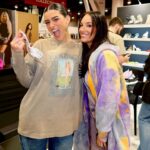 Heidi D'Amelio Instagram - You know it’s a good day when you see the giant pink Ravina shoe! 😍 Back at it in Vegas for @projectshow with @dameliofootwear! …y’all already know I still had to dress up for Mardi Gras while I’m here 💜💛💚