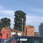 Helen Mirren Instagram - out and about on a beautiful spring day in Milan with all the chic Milanese. The green buildings are famous architectural addition to the City. I think they are awesome