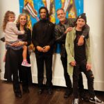 Hilarie Burton Instagram - Anniversary date gives me an excuse to highlight Day 5 of artists making the world a more magical place! Years ago, @jeffreydeanmorgan and I wandered into @chasecontemporary gallery here in NYC. We’ve always been art gallery dwellers. That was one of our first dates in Santa Fe…hopping from gallery to gallery across the square. We have hit up galleries in London and Barcelona and Rhinebeck and little tiny small towns across America. Like moths to a flame. Chase Contemporary Gallery always had pieces in the window that stopped us in our tracks. What I love about this gallery is how inclusive they have been to our children. Every time we go in there, the owners make a point of introducing our kids to the artists and asking them real questions about their interests and what they like about the exhibits. I’m so grateful that they are nurturing an appreciation for art in my kids. Last year for our anniversary Jeffrey surprise me with this @connorbrothersofficial piece that I’m obsessed with. This year, to celebrate my book, he came home with these two fabulous book covers from the same artists. As luck should have it, the gallery was hosting a party for its current artist in residence… @lilblackgoat . Logan Sylve is such a talent, and we loved discussing his background of growing up in Louisiana and learning about his current adventures in Paris. I love his use of color and some of the mischievous toothy grins in his paintings. George became obsessed with this giraffe painting! Places like this nurture young artists and so we love visiting every chance we get. I hope that you guys give them a follow and then find galleries in your own town to support. Thank you guys for a magical date night. The Morgans had a blast.