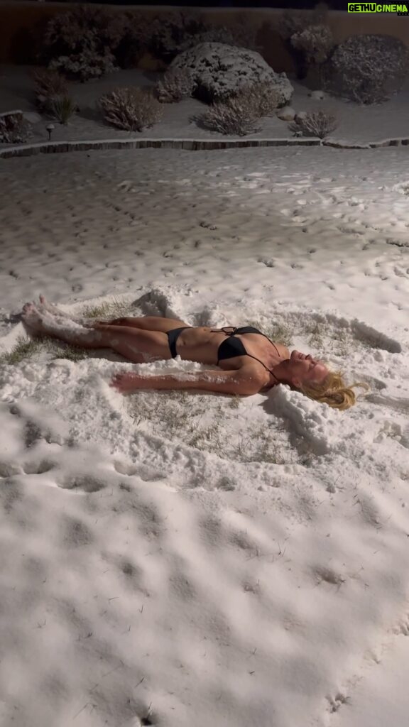 Holly Holm Instagram - Making snow angels while I wait for my @odin_icebaths to get installed. ❄️ 😉