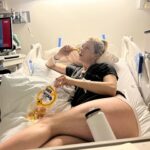 Iliza Shlesinger Instagram – Postpartum done right. I didn’t stop eating from the moment I had him until we left the hospital. ➡️ swipe to the end to see the @haveacornchips I accidentally dropped into his bassinet as I stood over him power eating and staring at my sweet little boy. It got wedged between the plastic and the mattress 🤷‍♀️ Hope he likes salty corn milk! 🧂 🌽 🥛
💦 the @yeti I just realized was there but YETI deserves a shoutout because the good ice they gave me at the hospital stayed AS ICE even after I got home. Best part is I’ve had it for years and it doesn’t give me lead poisoning. Bring it to your next delivery!