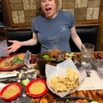 Iliza Shlesinger Instagram - Last Saturday night as the parents of only one child. We @galuten fully leaned into being an American suburban family of 4 by going to Costco then going for Mexican in the valley. We are so excited to be holding our little boy around this time next week 🤞 shout out to @newbalancelifestyle for keeping me athletic looking from the belly down.