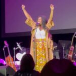 India.Arie Instagram - Take a Moment to read my 💜 I take JOY in remembering our Ancestors. We exist and the way we do BECAUSE of them. Yes we are our OWN SELVES And ALSO YES We are a part of an interconnected multti generational whole ~ and Its not all easy. NOTHING IS ALL EASY. But keeping the music of our musical ancestors alive is ALL JOY! The Ancient Egyptians believed we all die twice. First, when we take our last breath. Second, when our name is spoken for the last time. At our ( 2nd ) Annual Atlanta SongVersation shows we we will honor our Ancestors every time! Last year @kevinrossmusic and samg BABY COME TO ME BY James Ingram (rip) Patti Austin (who thank God is still alive and kicking and SO FUN! THIS YEAR WE HONORED ONE OF THE GREATEST @luthervandross I got to meet him ONCE and he was SO COOL, and VERY KIND to me. He spoke a word over my life ~ that, had THANKFULLY proved to be true. THANK YOU LUTHER for showing us what it means to let our TONE sing the song. And I cant WAIITTT TO SEE THE NEW DOCUMENTARY! p.s. there was a little (BIG) surprise (actually 2) at the end of this moment ~ you had to be there lol maybe next year you will! #luthervandross #soamazing #loveletterindiaarie #worthy #songversation