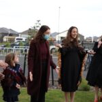 Jacinda Ardern Instagram - One of those mornings - managed to somehow slice my hand while unveiling a school plaque, then mid cutting a cake somehow spread icing liberally on my arm, pants and mask. But none of that mattered - this was the most beautiful school opening. Thank you Te Rōhutu Whio School for being so welcoming, and so fun! Hoping this accident prone morning doesn’t continue…I’m off to a meat works 😳
