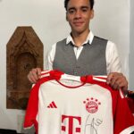 Jamal Musiala Instagram - Your chance to win a 𝕊𝕀𝔾ℕ𝔼𝔻 jersey! ✍️🏆 Simply comment "#MiaSanMeister" 👇🔴⚪ More information in bio. ℹ️ #FCBayern #Musiala @jamalmusiala10