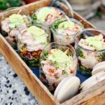 Jamie Oliver Instagram - Some of you lovely lot might know this as a 70s dinner party staple but now it's just as welcome at your picnic !! It is of course.....the might prawn cocktail !!! Layers of succulent prawns with lashings of cocktail sauce, avocado, tomatoes and all topped off with crispy pancetta crumbs, this really is a thing of beauty! Hit the link in my bio for the recipe x x #prawncocktail #weekendvibes #summer