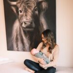 Jana Kramer Instagram - Little Saturday story…..I wrote about this cow painting in @thenextchapterjk about how she spoke to my soul when I was at my lowest and in the middle of quarantine in Vancouver. I shared with the owner of the Airbnb just how much I loved this painting and within months she had surprised me with it. It now hangs in the kitchen area and when we moved into our new house I said to Allan, “sorry that we have this random huge cow hanging in our kitchen area but it’s kind of a long story and it means a lot to me”. He said , “it’s a Scottish highland cow, I grew up with them and love them”. It all made sense in that moment. ♥️#godwinks