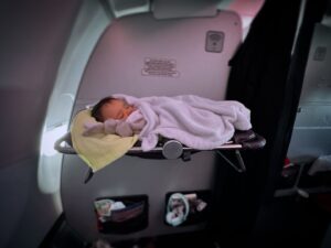 Janette Manrara Instagram - Our first long haul flight and it was not as easy or straight forward as we would have liked, but we made it to Miami and in the midst of the madness we found pockets of joy and excitement to be travelling together as a little family. Also, how cute is Lyra sleeping in the bassinet? 🥰 

Thanks for checking in everyone 🤍

#parenting #longflight #travellingwithkids #TheSkorjanecs