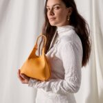 Janina Uhse Instagram - Anzeige// Tadaaa... Endlich darf ich es mit euch teilen. Proudly present. Ich bin das neue Gesicht der ikonischen DUA Bag von @giannichiarini ❤️ Ich hatte unfassbar tolle Tage in Mailand. Beim Shooting durfte ich bereits mit dem besten Team den Sommer einläuten. Elegant, zeitlos und orange - Lieben wir! #giannichiarini #gc #DUAbag #TheShapeOfYou