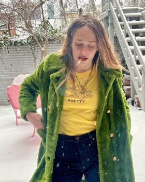Jemima Kirke Instagram - I fucked Oscar the Grouch and all I got was this lousy coat. He said I was pretty. In a trashy kinda way. 

PS I’ve decided to continue smoking as an act of radical acceptance that looks are ephemeral. I’ll be hanging out at the finish line, cigarette in hand, ready to compare laugh lines. Mine will be deeper than yours. 

(Shirt by me. DM for price. 🫖☕️)
