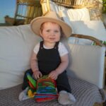 Jenna Johnson Instagram - Cheeks a fedora = 🥹😭🥰🤩🤭 Do you see the hint of red in his hair?!?! So curious to see what his hair color will actually turn out to be!