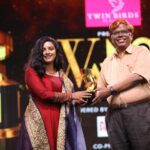 Jenna Ortega Instagram - Thank you @jfwdigital for the award. Receiving an award from the ‘Real Hero-Chandru Sir’ is truly an honour to me. Thank you so much, sir. Styled by: @zohibzayi MUA: @shibin4865 👗: @khalifcelebration