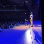 Jenny Slate Instagram – Thank you to the very funny and very well-dressed @marybethbarone for opening for me @the_wilbur and @townhallnyc, what a fun person and congrats to both of us for performing our hearts out during the eclipse, tbh. (Also this whole darn look: necklace, bathing suit top as shirt and very fun trousers all by @rachelcomey, and powerful perfect good-luck scrunchie by my fav store @no6store)