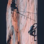 Jimmy Chin Instagram - The shot. Getting the shot. @deanpotter on Concepcion in 2003, soon after he'd established the climb. At the time, it was one of the hardest and certainly most striking cracks in the Utah desert. Dean was a good friend. We shot together a lot over the years. It was always an adventure. He pushed me to the brink more than a few times. He had high expectations of himself and high expectations of the people around him. He can be credited with my obsessive prep on high angle shoots; I was terrified of messing him up or slowing him down on the wall. Shooting with him was good training for life. Dean was also intensely creative and such a visionary that some of the things he pioneered are now their own specialized sports. Complex and sometimes misunderstood, he could be soft spoken one moment and a gladiator the next. He could also be extremely mischievous and loved a good laugh (sometimes at your expense). He always seemed to push the boundaries personally, physically, mentally. It was non stop. There was an urgency to his life that was hard to keep up with. I would listen to him after what would be a casual day for him, knowing it would have been the pinnacle of most climbers’ careers. I looked up to him a lot. I would say live like Dean but none of us would survive a day trying. Photo 2 by @jimhurst