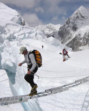 Jimmy Chin Instagram - Deeply saddened to hear about the passing of David Breashears this week. He was a friend and mentor and had an outsized influence on many peoples’ lives, including mine. I looked up to him long before I met him. His endeavors as an incredibly bold climber and world class mountaineer were legendary. He was also a human rights advocate, spokesperson for climate issues and someone I considered to be the greatest mountain filmmaker of our time. Among many notable films, David’s Everest IMAX film would become the highest grossing IMAX film of all time. It was a cultural phenomena for an entire generation.

In 2004, David invited me to climb Everest and film with him, @edviesturs, Veikka Gustaffson and Robert Schauer. I was a long shot candidate to fill the role he was proposing. I was young and had just started filming the year before. It was a pivotal moment in my career. David was intimidating and opinionated but deeply caring and had a razor sharp wit. He was brilliant and, some would say, complex. His exacting standards and high expectations pushed me to rise to a new and much higher level both as a mountaineer and as a cinematographer. We eventually climbed Everest together that year and became close friends. I learned a lot on that expedition. He taught me how to approach a major production on a big expedition and the attitude and ethos required to pull off a challenging project in good style. These were lessons I’ve carried with me throughout my career. I am forever grateful that he believed in me and for my time with him.

Here are a few images from the 2004 expedition including one of my favorite post Everest summit bad hair day images.

Rest In Peace my friend. You will be dearly missed.